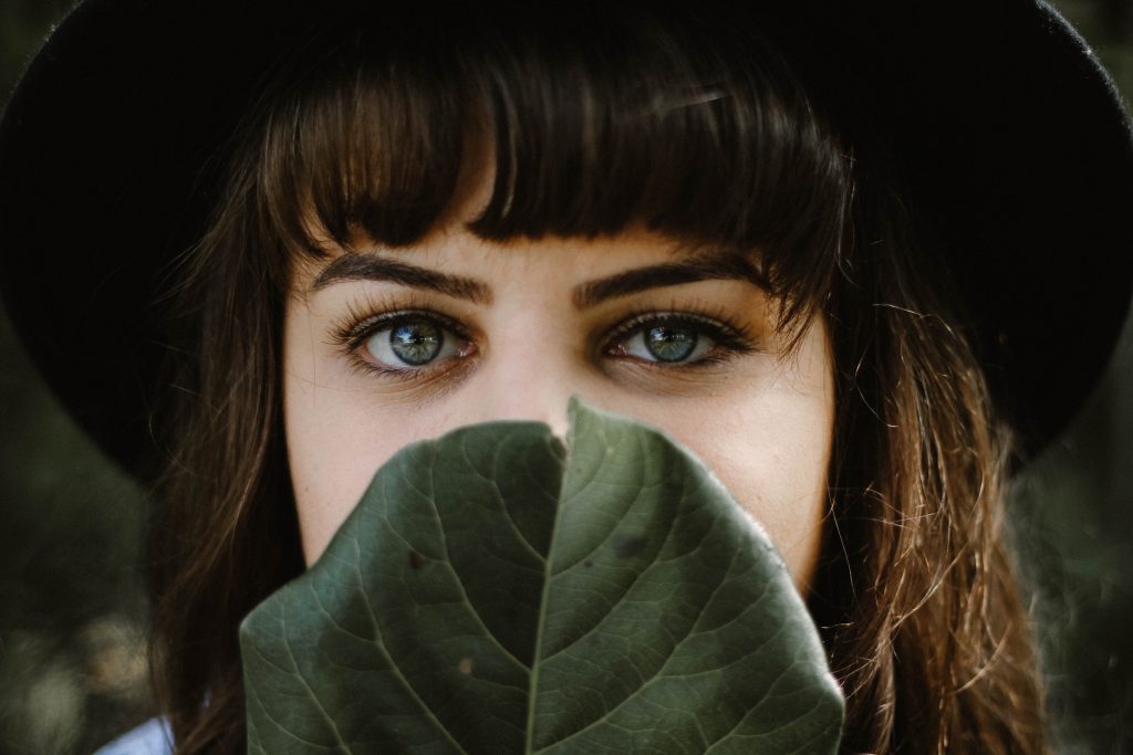 a person with a green jacket