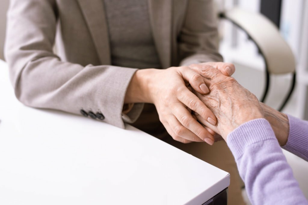 close-up of people shaking hands