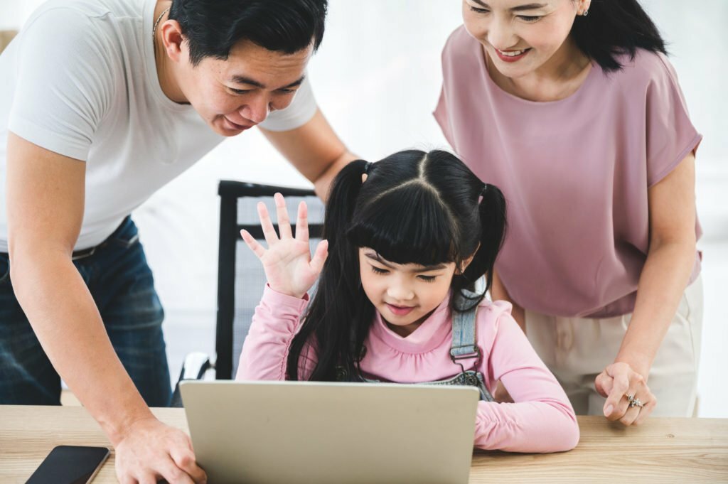 Asian children family with father and mother at home, little girl childhood development